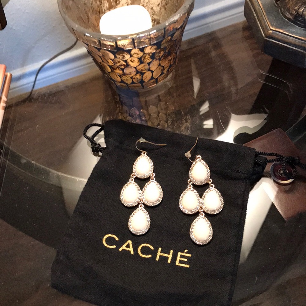 Cache dressy dangle earrings.